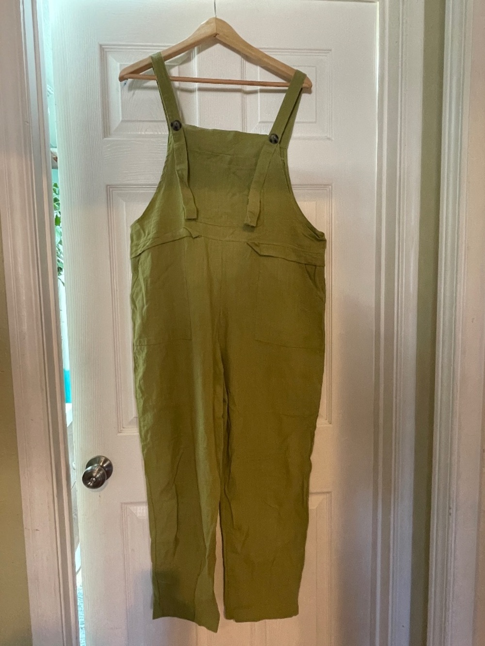 Green linen overalls